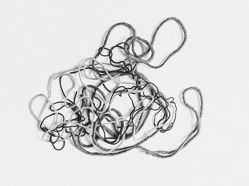 A tangle of string symbolising the idea of making trouble for a client